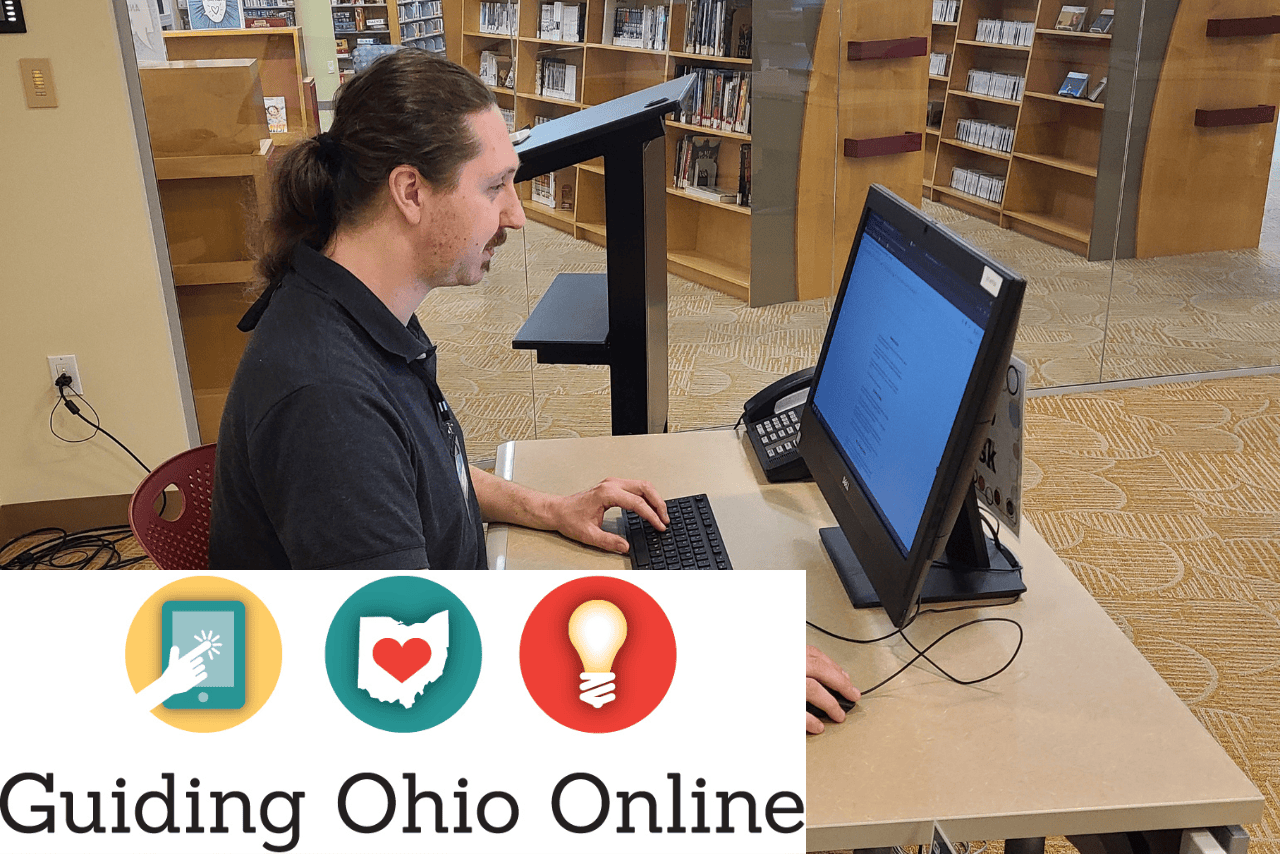 Man sitting looking at computer screen for Guiding Ohio Online